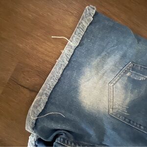 Women’s distressed jean shorts.